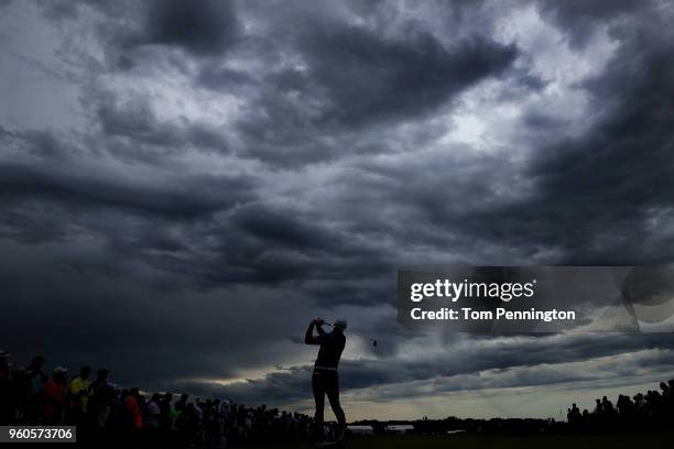 Jordan Spieth plays his shot from the second tee after a four hour rain delay during the final round of the AT&T Byron Nelson at Trinity Forest Golf...