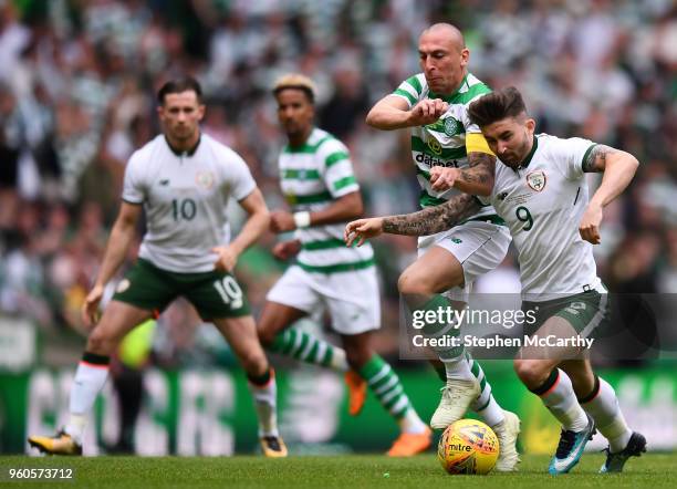 Glasgow , United Kingdom - 20 May 2018; Sean Maguire of Republic of Ireland XI is tackled by Scott Brown of Celtic during Scott Brown's testimonial...