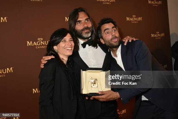 Actor Khaled Mouzanar who played in Capharnaum from awarded director Nadine Labaki pose with guest during the Magnum Beach Closing Party during the...