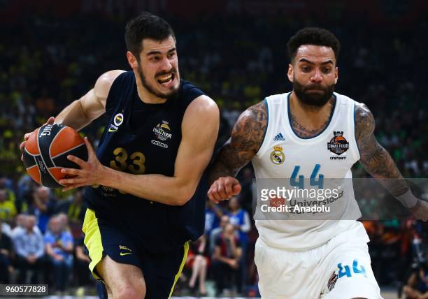 Nikola Kalinic of Fenerbahce in action against Jeffery Taylor of Real Madrid during the Turkish Airlines EuroLeague Championship Game between...