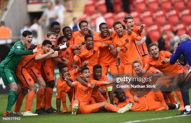 The Netherlands team celebrate with the trophy after the UEFA European Under-17 Championship Final between Italy and the Netherlands at New York...