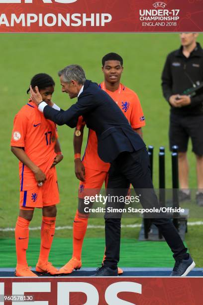 Netherlands coach Kees van Wonderen congratulates Crysencio Summerville of Netherlands after the UEFA European Under-17 Championship Final match...