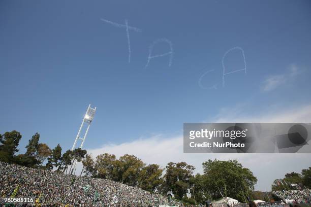 An airplane writes with smoke the word Taca in the sky during the Portugal Cup Final football match CD Aves vs Sporting CP at the Jamor stadium in...