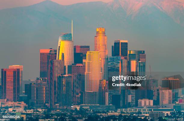 los angeles at twilight - los angeles skyline stock pictures, royalty-free photos & images