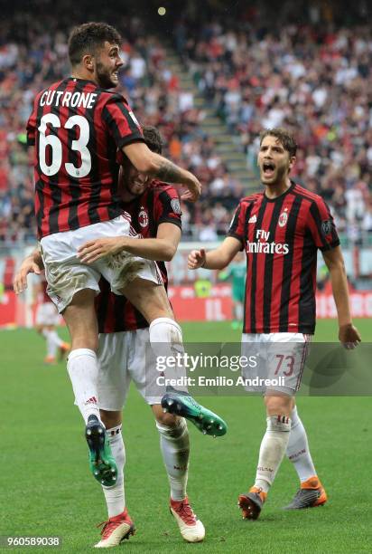 Patrick Cutrone of AC Milan celebrates his second goal with his team-mate Hakan Calhanoglu during the serie A match between AC Milan and ACF...