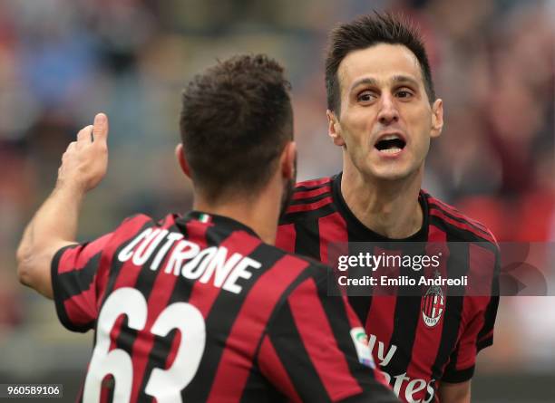 Nikola Kalinic of AC Milan celebrates his goal with his team-mate Patrick Cutrone during the serie A match between AC Milan and ACF Fiorentina at...