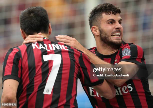 Patrick Cutrone of AC Milan celebrates his goal with his team-mate Nikola Kalinic during the serie A match between AC Milan and ACF Fiorentina at...