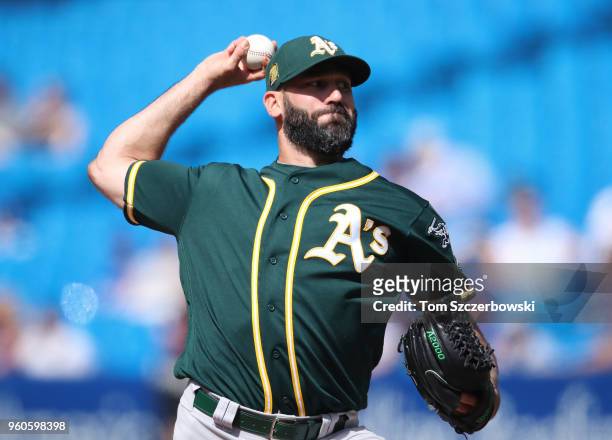 Chris Hatcher of the Oakland Athletics delivers a pitch in the eighth inning during MLB game action against the Toronto Blue Jays at Rogers Centre on...