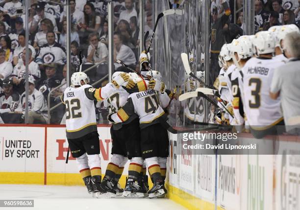 Ryan Reaves of the Vegas Golden Knights celebrates with teammates after scoring a second period goal against the Winnipeg Jets in Game Five of the...