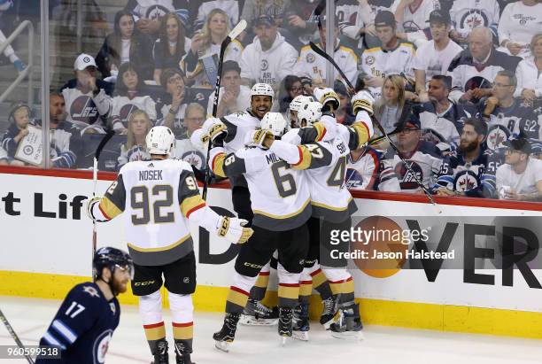 Ryan Reaves of the Vegas Golden Knights celebrates with teammates after scoring a second period goal against the Winnipeg Jets in Game Five of the...