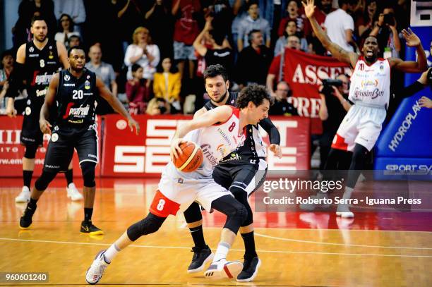 Amedeo Della Valle and Jalen Reynolds of Grissin Bon competes with Alessandro Gentile and Oliver Lafayette and Filippo Baldi Rossi of Segafredo...