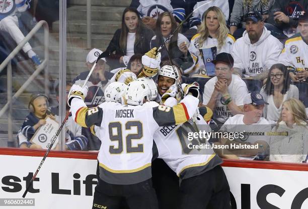 Ryan Reaves of the Vegas Golden Knights celebrates with teammates after scoring a second period goal against the Winnipeg Jets in Game Five of the...