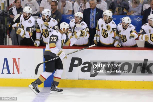 Ryan Reaves of the Vegas Golden Knights celebrates with teammates after scoring a second period goal against the Winnipeg Jets in Game Five of the...