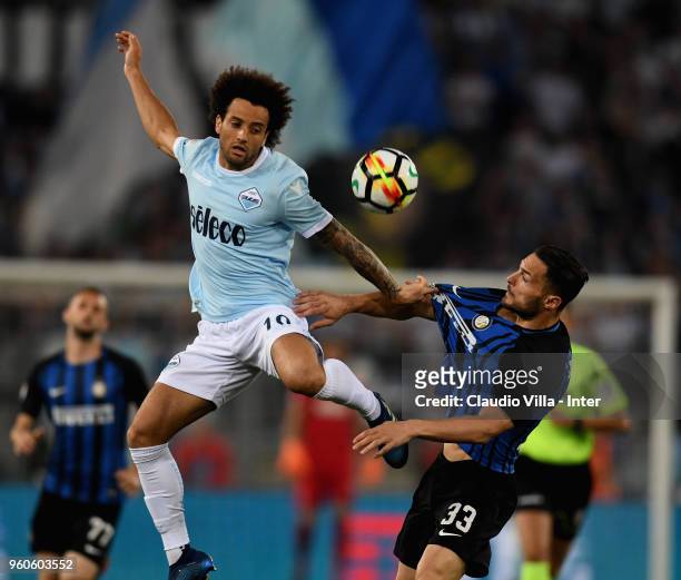 Danilo D'Ambrosio of FC Internazionale competes for the ball with Felipe Anderson of SS Lazio during the serie A match between SS Lazio and FC...
