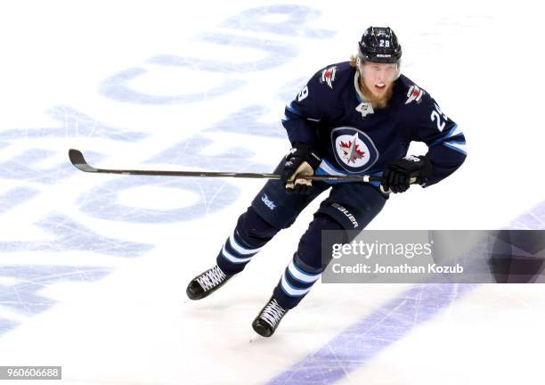 Patrik Laine of the Winnipeg Jets keeps an eye on the play during second period action against the Vegas Golden Knights in Game Five of the Western...
