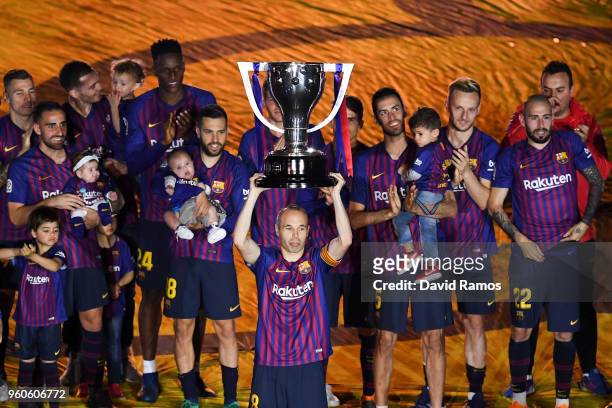Barcelona players celebrate with La Liga trophy at the end of the La Liga match between Barcelona and Real Sociedad at Camp Nou on May 20, 2018 in...