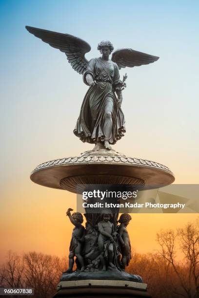 bethesda fountain - angel of the waters, central park, nyc - new york central park fountain stock pictures, royalty-free photos & images