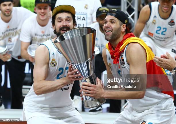 Players of Real Madrid celebrate their victory after defeating Fenerbahce at the end of the Turkish Airlines EuroLeague Championship Game between...