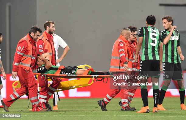 Federico Peluso of US Sassuolo is stretchered off during the serie A match between US Sassuolo and AS Roma at Mapei Stadium - Citta' del Tricolore on...