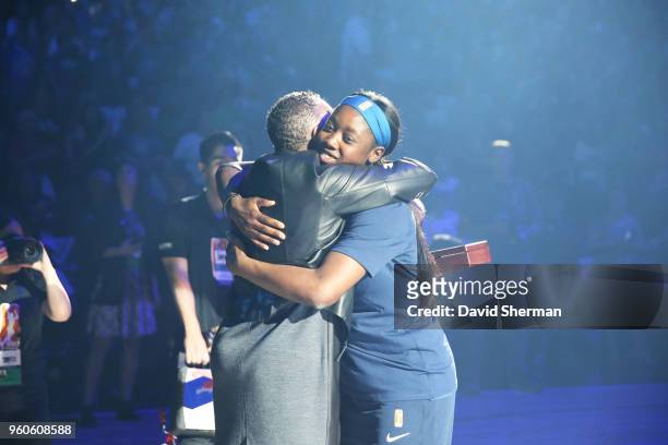 Alexis Jones of the Minnesota Lynx hugs Lisa Borders as she receives her 2017 WNBA Championship ring before the season-opening home against the Los...