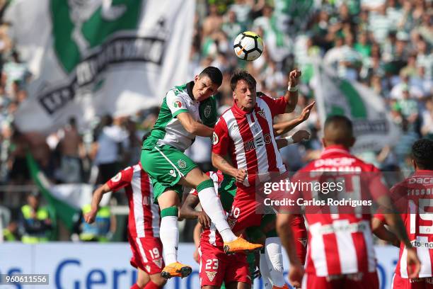 Sporting CP midfielder Rodrigo Battaglia from Argentina vies with CD Aves midfielder Vitor Gomes from Portugal for the ball possession during the...