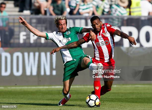 Sporting's defender Fabio Coentrao vies for the ball with Desportivo Aves's defender Nildo Petrolina during the Portugal Cup Final football match...