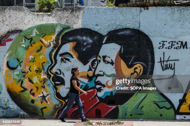 Wall art featuring the president Maduro and the ex president Chavez. The presidential elections called by the National Constituent Assembly were...