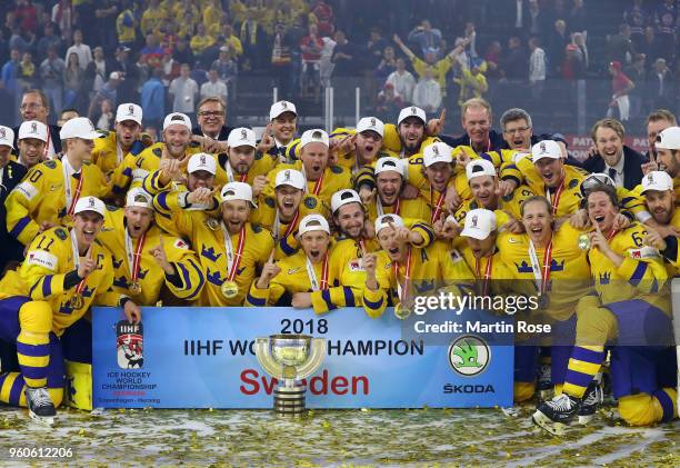 The team of Sweden celebrate winning the gold medal after the 2018 IIHF Ice Hockey World Championship Gold Medal Game game between Sweden and...