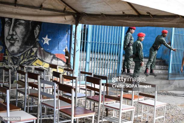 Police seen guarding at one of the polling stations. The presidential elections called by the National Constituent Assembly were carried out calmly...