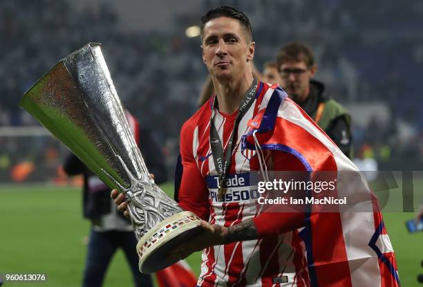 Fernanado Torres of Athletico Madrid holds the trophy during the UEFA Europa League Final between Olympique de Marseille and Club Atletico de Madrid...