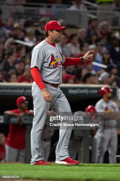 Mike Matheny of the St. Louis Cardinals looks on against the Minnesota Twins on May 15, 2018 at Target Field in Minneapolis, Minnesota. The Twins...