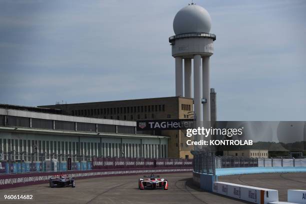 English driver Alex Lynn of DS-Virgin and German driver Nick Heidfeld of Mahindra runs during theQualifying Session in BMW Berlin E-Prix in Flughafen...