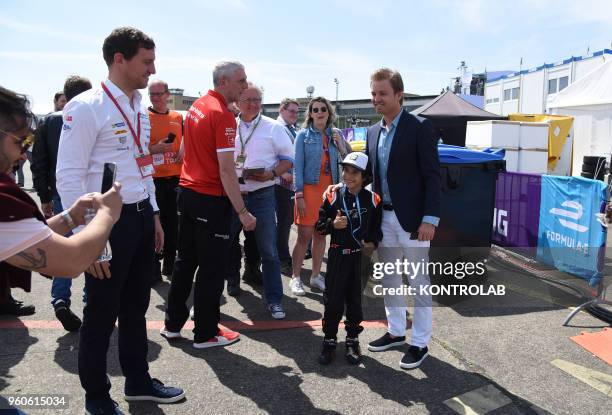 Formula One World Champion Nico Rosberg arrives at the circuit during the Qualifying Session in BMW Berlin E-Prix in Flughafen Tempelhof Airport.