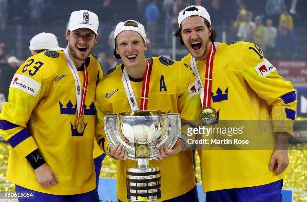 John Klingberg of Sweden celebrate with Oliver Ekman Larsson and Dennis Everberg after the 2018 IIHF Ice Hockey World Championship Gold Medal Game...