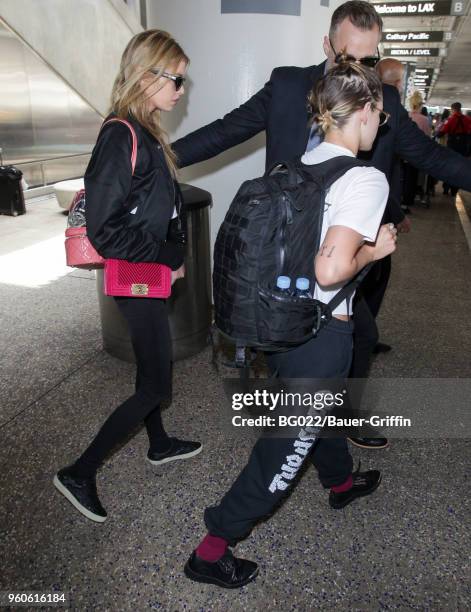 Stella Maxwell and Kristen Stewart are seen at LAX on May 20, 2018 in Los Angeles, California.