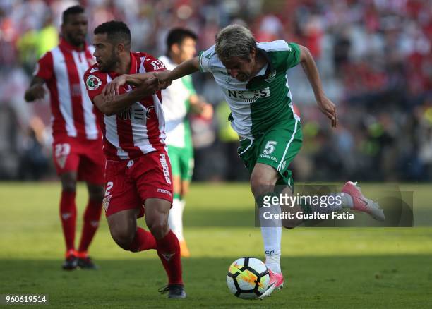 Sporting CP defender Fabio Coentrao from Portugal with CD Aves defender Rodrigo Soares from Brazil in action during the Portuguese Cup Final match...