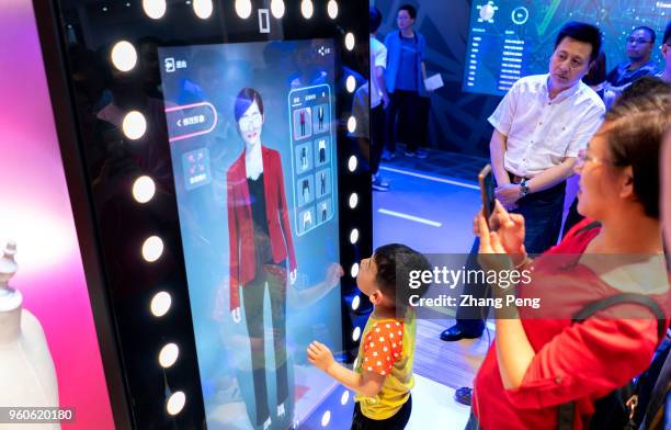 People are experiencing the AI fitting technology while shopping on Tmall.com or Taobao.com in the future. Alibaba show its smart technology in...