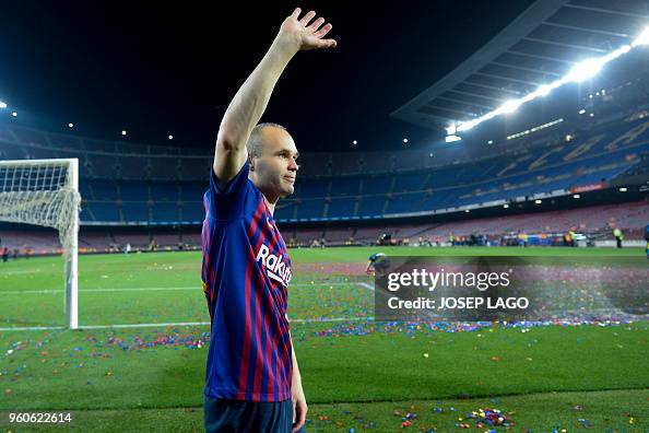 Iniesta Muscles TOPSHOT - Barcelona's Spanish midfielder Andres Iniesta waves at the ...
