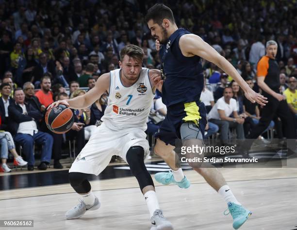 Luka Doncic of Real Madrid in action against Nikola Kalinic of Fenerbahce during the Turkish Airlines Euroleague Final Four Belgrade 2018 Final match...