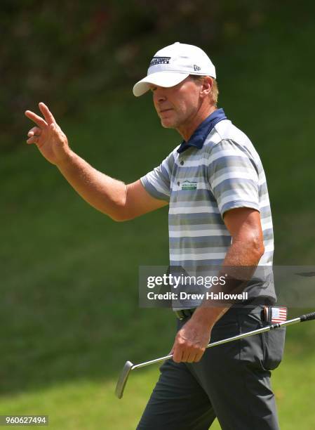 Steve Stricker of the United States waves after a birdie on the 14th hole during the final round of the Regions Tradition at Greystone Golf & Country...