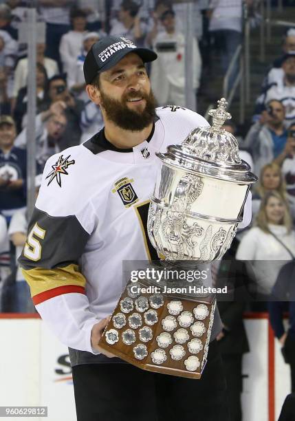 Deryk Engelland of the Vegas Golden Knights celebrates with the Clarence S. Campbell Bowl after defeating the Winnipeg Jets 2-1 in Game Five of the...
