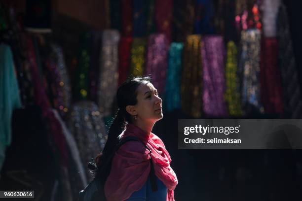 adult woman wearing traditional headscarf in sanliurfa, turkey - şanlıurfa stock pictures, royalty-free photos & images