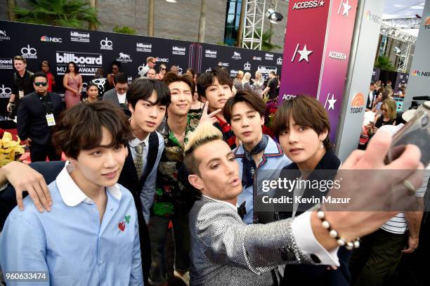 Dancer-TV personality Frankie Grande takes a selfie with musical group BTS at the 2018 Billboard Music Awards at MGM Grand Garden Arena on May 20,...