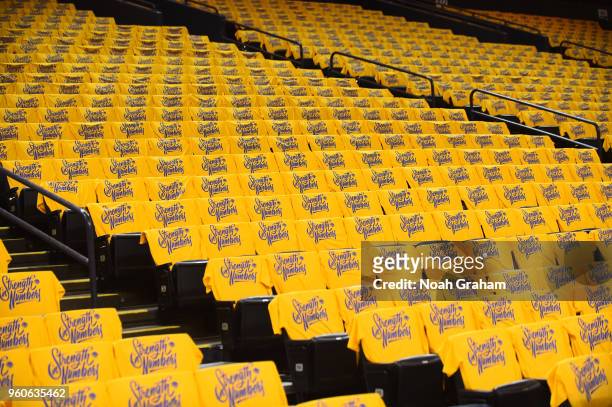 Shirts are laid out for fans before the game between the Houston Rockets and the Golden State Warriors in Game Three of the Western Conference Finals...