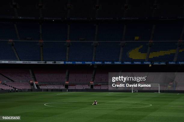 Andres Iniesta of FC Barcelona sits on the pitch at the end of La Liga match between Barcelona and Real Sociedad at Camp Nou on May 20, 2018 in...