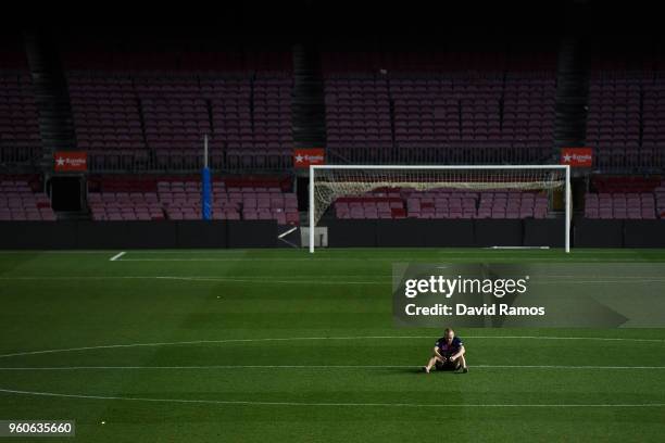 Andres Iniesta of FC Barcelona sits on the pitch at the end of La Liga match between Barcelona and Real Sociedad at Camp Nou on May 20, 2018 in...