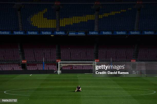 Andres Iniesta of FC Barcelona sits on the pitch at the end of La Liga match between Barcelona and Real Sociedad at Camp Nou on May 20, 2018 in...