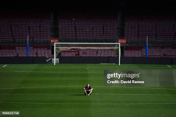 Andres Iniesta of FC Barcelona sits on the pitch at the end of La Liga match between Barcelona and Real Sociedad at Camp Nou on May 20, 2018 in...