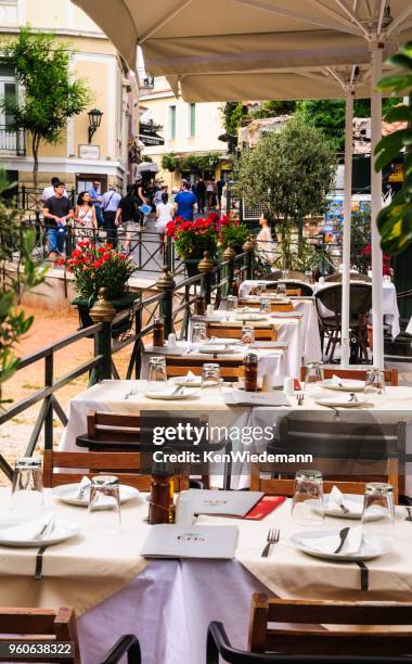 alfresco at eris - plaka greek cafe stock pictures, royalty-free photos & images
