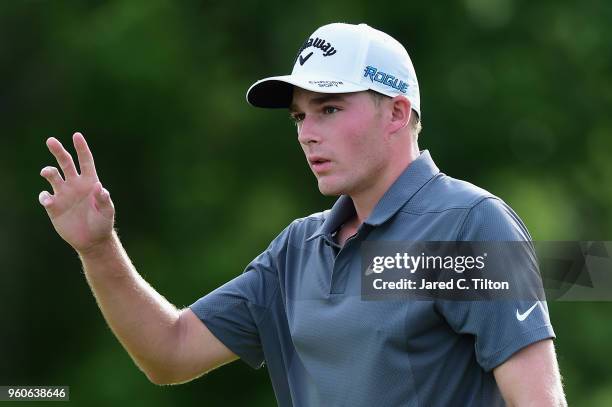 Aaron Wise reacts following his birdie putt on the ninth green during the final round of the AT&T Byron Nelson at Trinity Forest Golf Club on May 20,...
